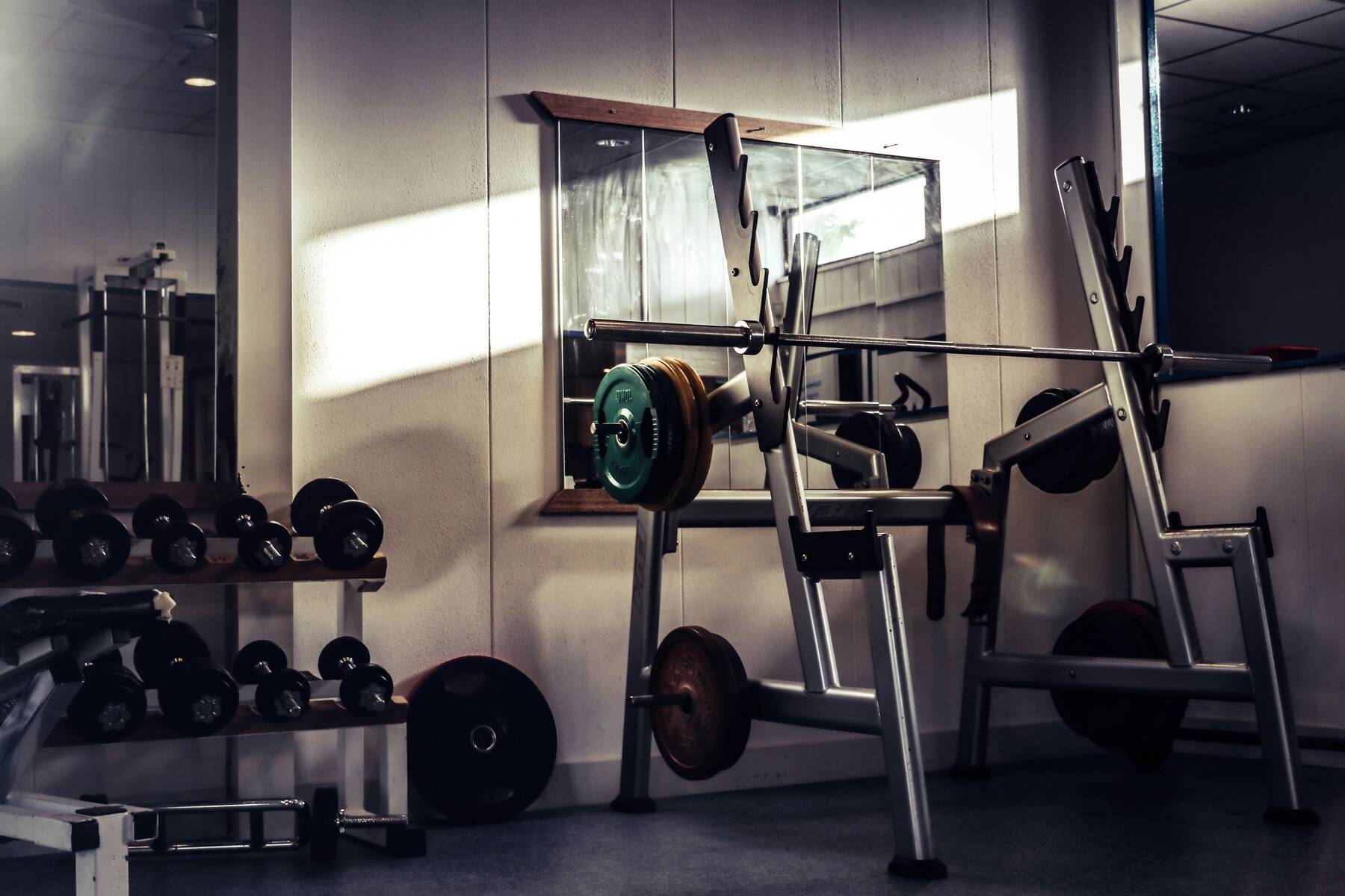 Old school gym lighted by a little sun stroke 