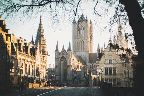 Beautiful skyline of Ghent, Belgium during sunrise in morning dust