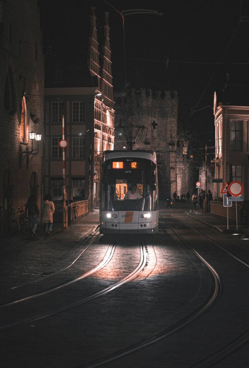 Tram in the old town of Gent, Belgium, at night.